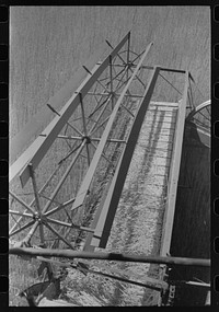 Walla Walla County, Washington. Showing how a combine works in a wheat field by Russell Lee