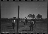 [Untitled photo, possibly related to: Volleyball game at the annual field day at the FSA (Farm Security Administration) farmworkers community, Yuma, Arizona] by Russell Lee