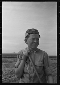 [Untitled photo, possibly related to: Boy in the vocational training class, gardening, at the FSA (Farm Security Administration) farmworkers community, Eleven Mile Corner, Arizona] by Russell Lee