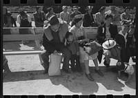 [Untitled photo, possibly related to: Santa Anita reception center, Los Angeles, California. The evacuation of Japanese and Japanese-Americans from West Coast areas under U.S. Army war emergency order. Waiting for registration] by Russell Lee