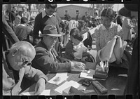 Santa Anita reception center, Los Angeles, California. The evacuation of Japanese and Japanese-Americans from West Coast areas under U.S. Army war emergency order. Registration by Russell Lee