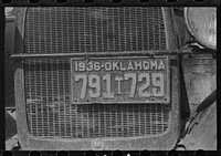 Radiator and license of Oklahoma cotton picker's car. San Joaquin Valley, near Fresno, California. Sourced from the Library of Congress.