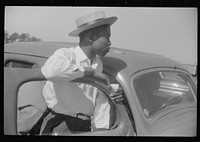 [Untitled photo, possibly related to: Migratory agricultural worker waiting at the Little Creek end of the Norfolk-Cape Charles ferry]. Sourced from the Library of Congress.