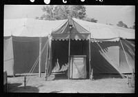 Traveling carnival at Old Trap, North Carolina. This troupe follows the migrants around and stops where there is a large settlement of them. A show generally consists of a band concert and movie and vaudeville. Sourced from the Library of Congress.