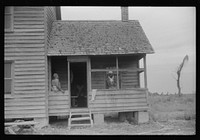 The last bit of washing is done while waiting for the truck to come and take these migratory workers and thirty-three others to another job at Onley, Virginia. They have been picking potatoes at Belcross, North Carolina. Sourced from the Library of Congress.