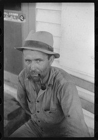 This Texan worked at the grading station in Belcross, North Carolina. He was getting 20 cents an hour. His one wish was someday to have a 100 acre sweet potato farm of his own in Florida. Sourced from the Library of Congress.
