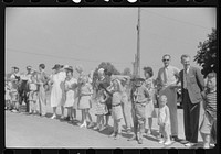 [Untitled photo, possibly related to: Boy Scouts acting as guard during soapbox auto race on July 4th at Salisbury, Maryland]. Sourced from the Library of Congress.
