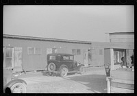 [Untitled photo, possibly related to: Camp for  migratory agricultural workers at Kings Creek Canning Company, Kings Creek, Maryland]. Sourced from the Library of Congress.