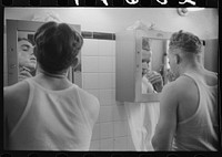 [Untitled photo, possibly related to: Truck drivers shaving at truck service station on U.S. 1 (New York Avenue), Washington, D.C.]. Sourced from the Library of Congress.