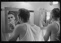 Truck drivers shaving at truck service station on U.S. 1 (New York Avenue), Washington, D.C.. Sourced from the Library of Congress.