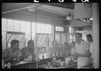 [Untitled photo, possibly related to: In the cafe at a truck drivers' service station on U.S. 1 (New York Avenue), Washington, D.C.]. Sourced from the Library of Congress.
