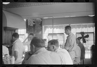 [Untitled photo, possibly related to: In the cafe at a truck drivers' service station on U.S. 1 (New York Avenue), Washington, D.C.]. Sourced from the Library of Congress.