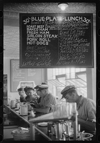 In the cafe at a truck drivers' service station on U.S. 1 (New York Avenue), Washington, D.C.. Sourced from the Library of Congress.