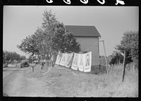 Blankets for sale at a novelty shop along U.S. 1, a few miles north of Washington, D.C.. Sourced from the Library of Congress.
