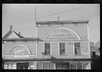 Hardware store and feed store on a main street in Caribou, Maine. Sourced from the Library of Congress.