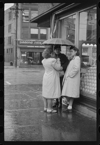 [Untitled photo, possibly related to: Waiting for a bus on a rainy day in Norwich, Connecticut]. Sourced from the Library of Congress.