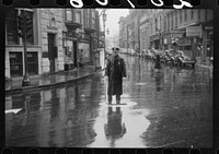 [Untitled photo, possibly related to: Street scene on a rainy day in Norwich, Connecticut]. Sourced from the Library of Congress.