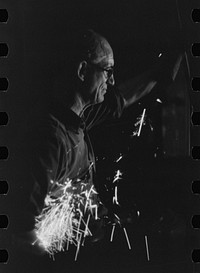 [Untitled photo, possibly related to: Tapping a furnace at the foundry of the Farrell-Binmingham Company, Ansonia, Connecticut]. Sourced from the Library of Congress.