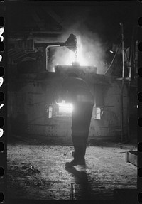 [Untitled photo, possibly related to: At the electric furnace in the foundry at the Farrell-Birmingham Company, Ansonia, Connecticut]. Sourced from the Library of Congress.