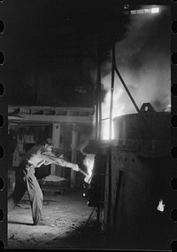 At the electric furnace in the foundry of the Farrell-Birmingham Company, Ansonia, Connecticut. Sourced from the Library of Congress.