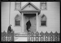 Old man entering Jewish synagogue for afternoon services. Colchester, Connecticut. Sourced from the Library of Congress.