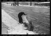 [Untitled photo, possibly related to: Children playing in snow in Norwich, Connecticut]. Sourced from the Library of Congress.