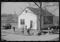 [Untitled photo, possibly related to: Small children waiting for their older brothers and sisters to be let out of school for lunch. Ledyard, Connecticut]. Sourced from the Library of Congress.