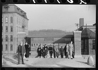 [Untitled photo, possibly related to: At the change of the shift at the Penomah Mills Inc., Taftville, Connecticut]. Sourced from the Library of Congress.