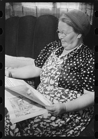 [Untitled photo, possibly related to: Foster, Rhode Island. Mrs. Simon Kertulla, wife of a Finnish poultry farmer, working at her old-fashioned loom]. Sourced from the Library of Congress.