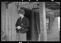 [Untitled photo, possibly related to: Mrs. Harvey who lost her husband in the last war is having to move out of her home in the Camp Croft area. She had been living there with a sister and a young nephew. Near Whitestone, South Carolina]. Sourced from the Library of Congress.