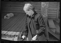 Mrs. Harvey who lost her husband in the last war is having to move out of her home in the Camp Croft area. She had been living there with a sister and a young nephew. Near Whitestone, South Carolina. Sourced from the Library of Congress.