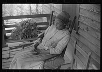 Mrs. L.A. Anderson, living in the Camp Croft area, who has come to help a neighbor move. Near Spartanburg, South Carolina. Sourced from the Library of Congress.