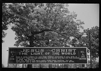 [Untitled photo, possibly related to: Sign outside a religious arbor in Eutaw, Alabama]. Sourced from the Library of Congress.