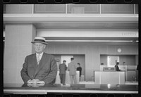 [Untitled photo, possibly related to: Washington, D.C. An airline's passenger in the lobby of the municipal airport]. Sourced from the Library of Congress.