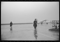 [Untitled photo, possibly related to: A plane taxiing off to the main runway at the municipal airport, in Washington, D.C.]. Sourced from the Library of Congress.