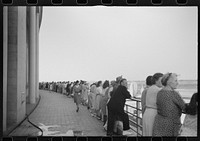 [Untitled photo, possibly related to: Visitors watching a plane take off at the municipal airport in Washington, D.C.]. Sourced from the Library of Congress.