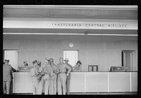 [Untitled photo, possibly related to: Soldiers at the counter in the municipal airport in Washington, D.C.]. Sourced from the Library of Congress.