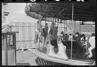 [Untitled photo, possibly related to: Amusements at a small American Legion fair near Bellows Falls, Vermont]. Sourced from the Library of Congress.
