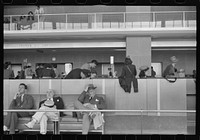 [Untitled photo, possibly related to: Passengers in the waiting room at the municipal airport in Washington, D.C.]. Sourced from the Library of Congress.