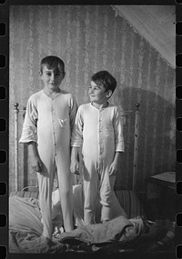 Two of the Gaynor children going to bed on their farm near Fairfield, Vermont. Sourced from the Library of Congress.