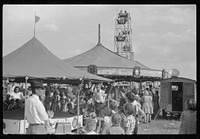 At the Greene County fair, Greensboro, Georgia. White schoolchildren were admitted free one day,  schoolchildren the next. Sourced from the Library of Congress.