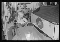 [Untitled photo, possibly related to: At the county fair in Greene County, Greensboro, Georgia]. Sourced from the Library of Congress.