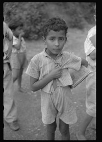 [Untitled photo, possibly related to: Children coming home from school on a road near Manati, Puerto Rico]. Sourced from the Library of Congress.