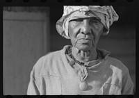 Old woman living in one of the slum "villages" in the northwestern part of the island. St. Croix, Virgin Islands. Sourced from the Library of Congress.