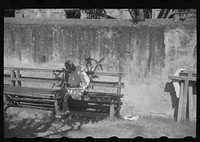 Charlotte Amalie, St. Thomas Island, Virgin Islands. An inmate of the insane asylum at the hospital. Sourced from the Library of Congress.