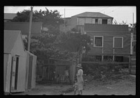 [Untitled photo, possibly related to: French Village, a small settlement on St. Thomas Island, Virgin Islands. Street scene]. Sourced from the Library of Congress.
