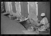 Charlotte Amalie, St. Thomas Island, Virgin Islands. Vegetable vendor along a side street near the waterfront. Sourced from the Library of Congress.