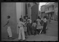 Boys playing on a street corner in Charlotte Amalie, Virgin Islands. Sourced from the Library of Congress.