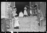 Charlotte Amalie, St. Thomas Island, Virgin Islands. After the morning service on Christmas day. Sourced from the Library of Congress.