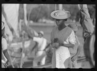 [Untitled photo, possibly related to: Charlotte Amalie, St. Thomas Island, Virgin Islands. Shoppers on Tortolla wharf]. Sourced from the Library of Congress.